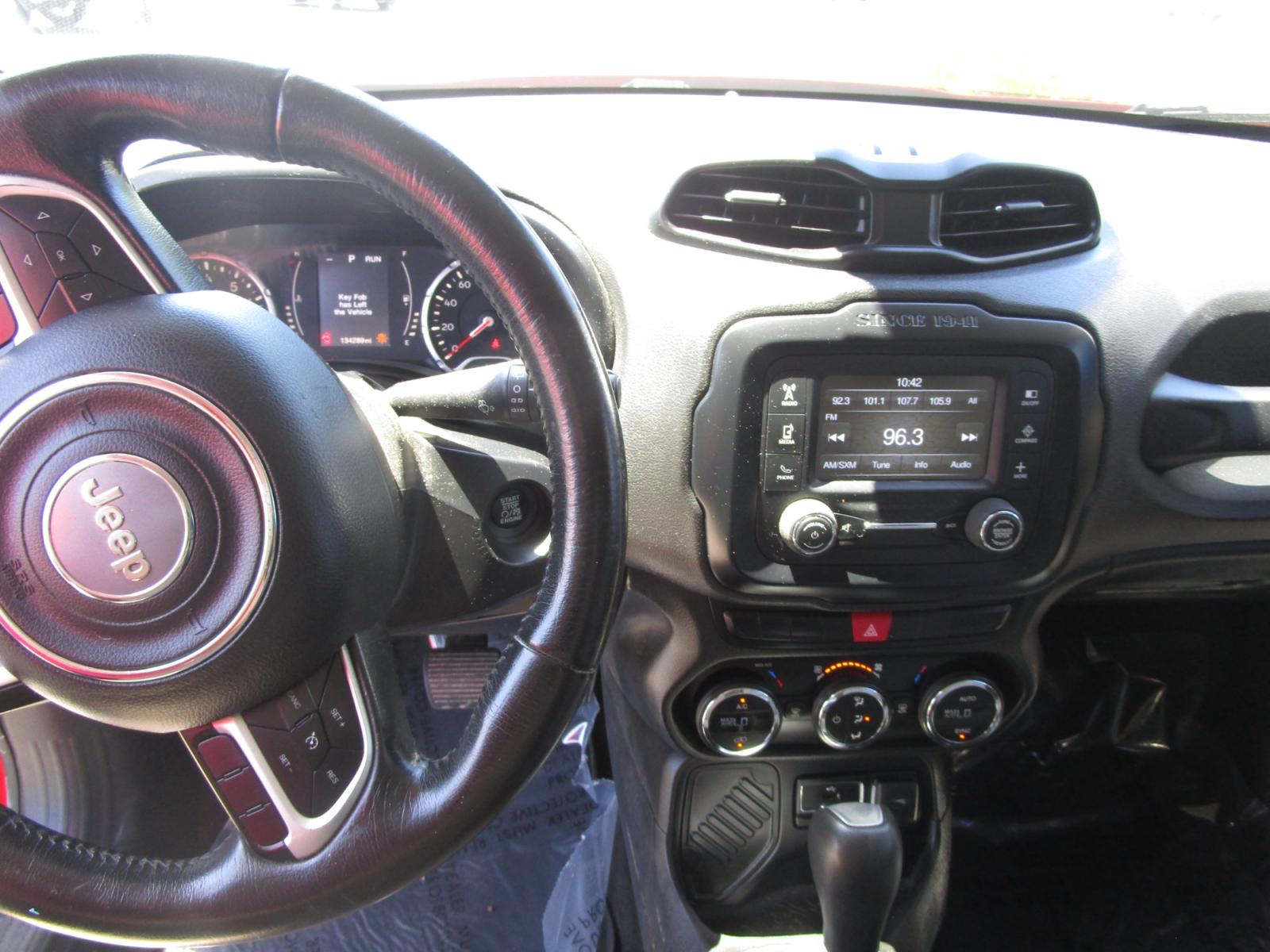 2015 RED /Black / Cloth Jeep Renegade Latitude FWD (ZACCJABT0FP) with an 2.4L L4 engine, 6-Speed Manual transmission, located at 1814 Albert Pike Road, Hot Springs, AR, 71913, (501) 623-1717, 34.494228, -93.094070 - Photo #5